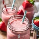 2 glass jars of strawberry smoothie