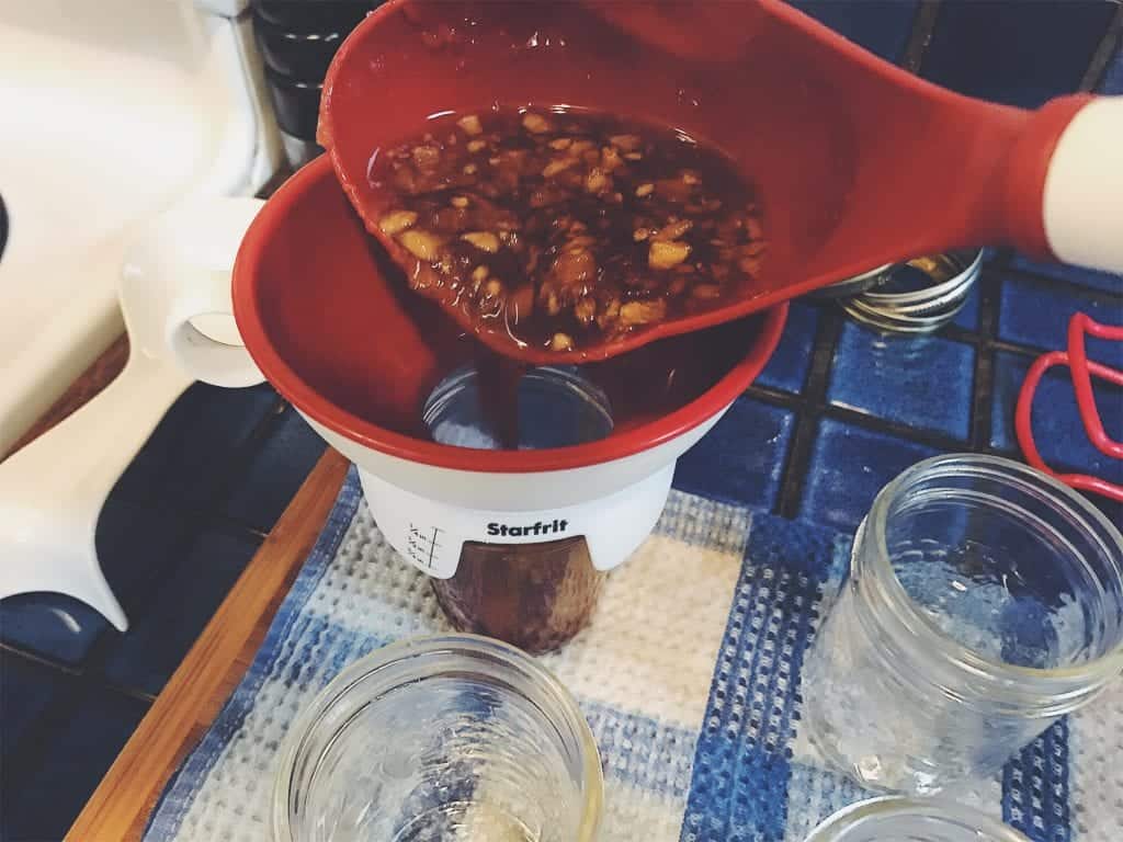 Pouring Apple Pie Jam into jars
