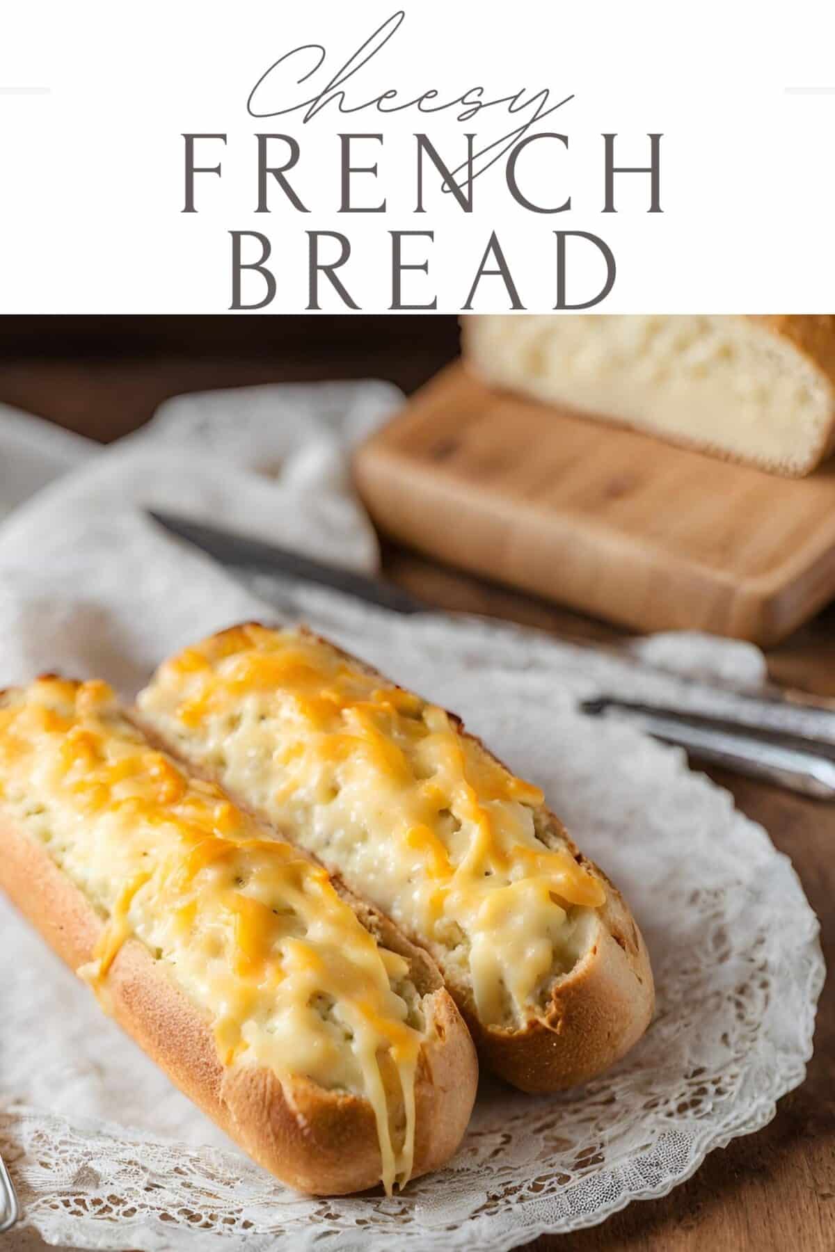 Cheese covered french bread on a lace placemat on a wooden table with the words cheesy french bread across the top of the image.