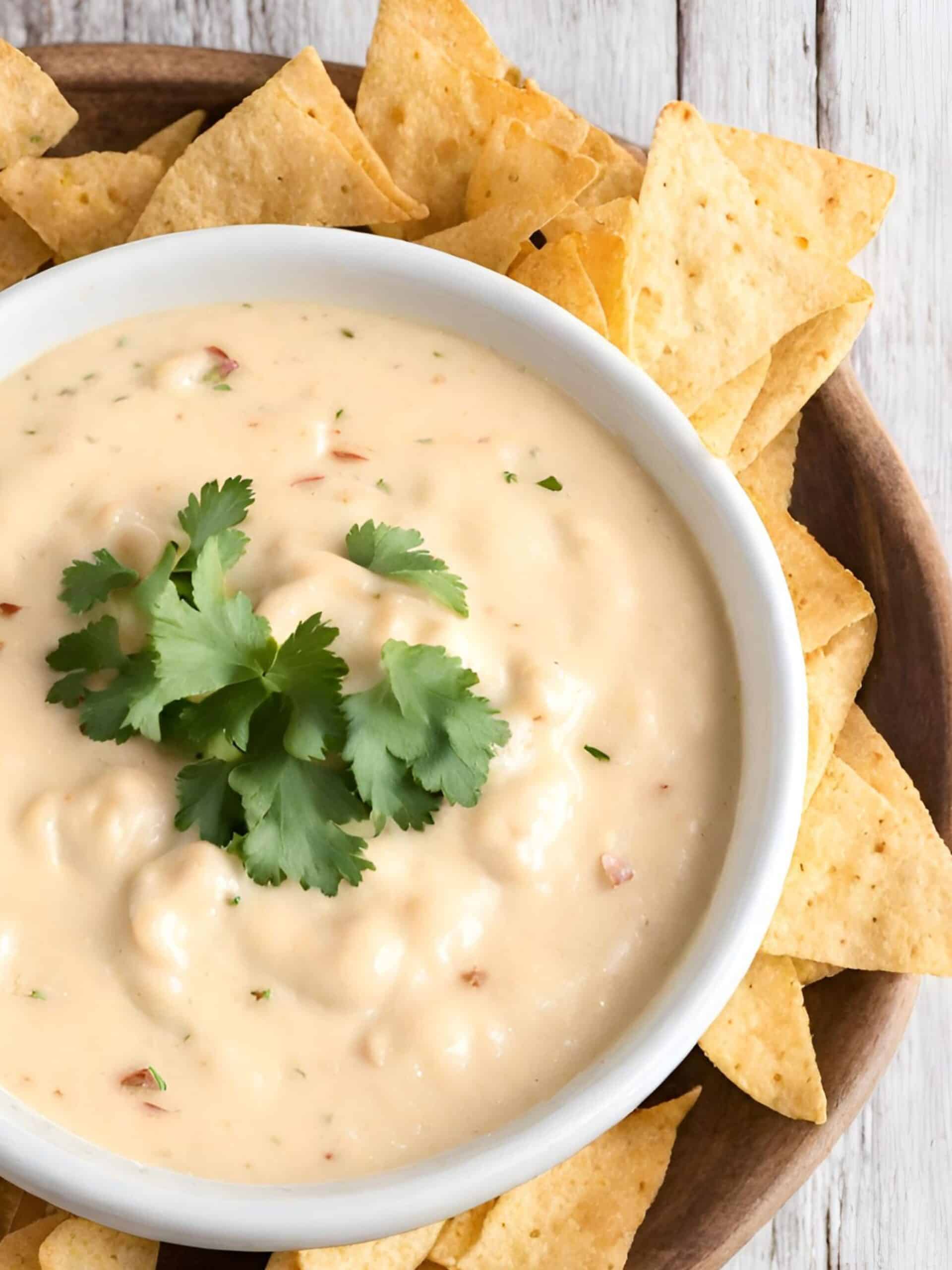 Do you love queso and chips? Enjoy them guilt-free with this Homemade Queso Dip made from scratch with fresh ingredients and no processed products!