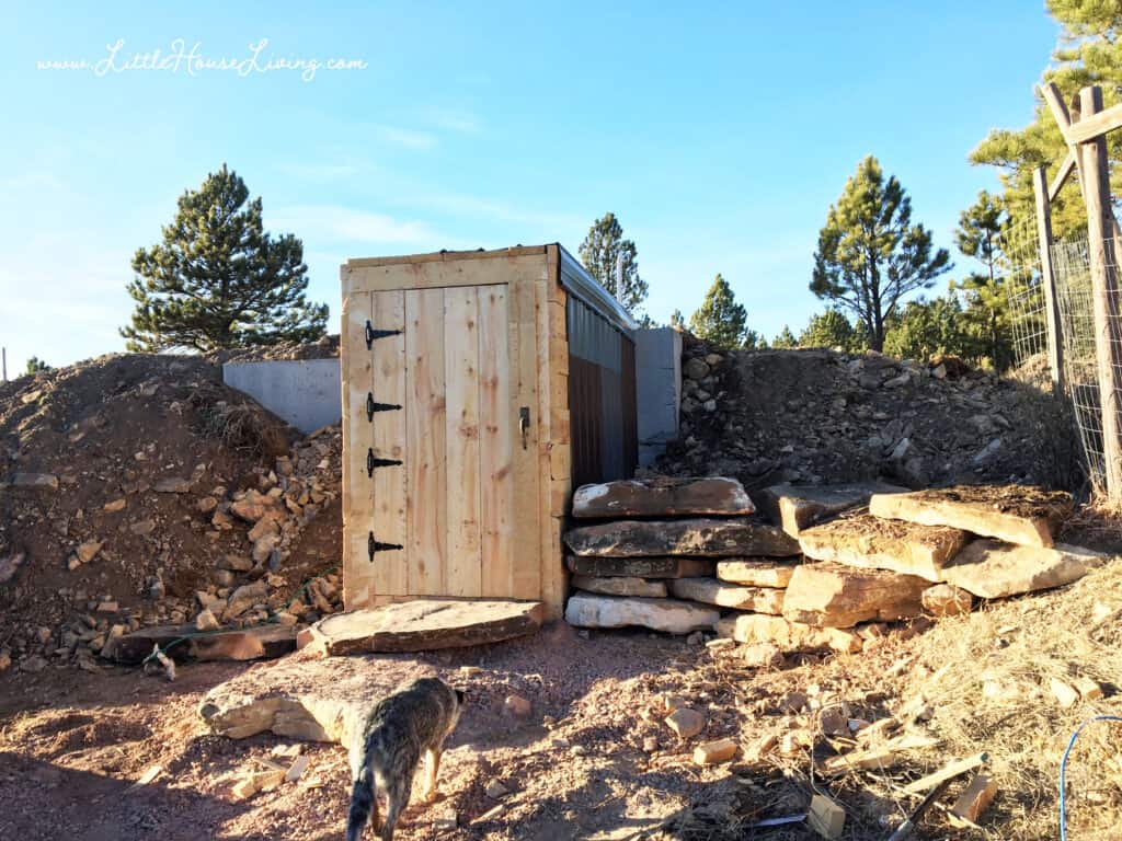 Building up the sides of the root cellar.