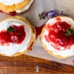 two strawberry shortcakes with whipped cream