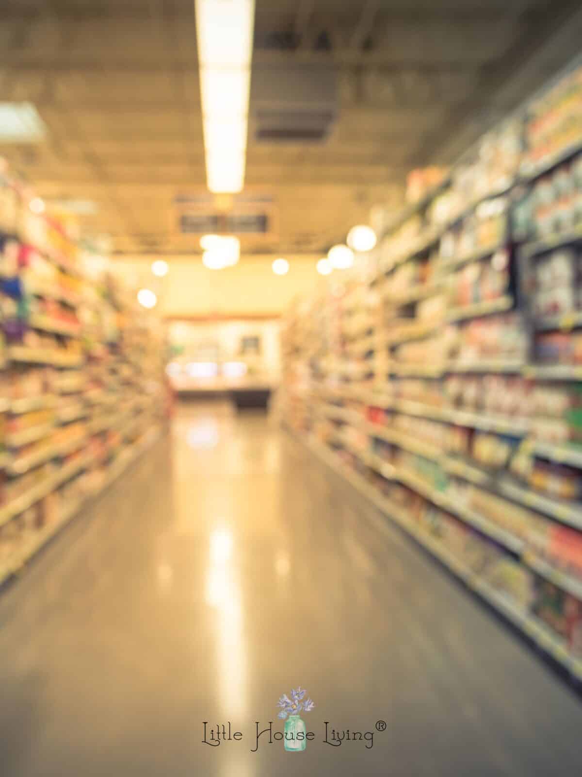 Grocery store aisle blurred out.