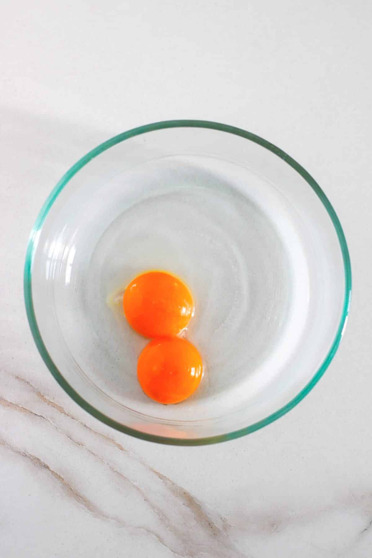 Eggs in a clear glass bowl.